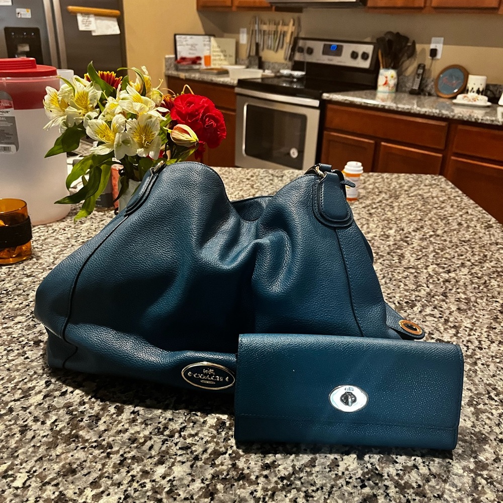 Teal blue Coach bag and wallet